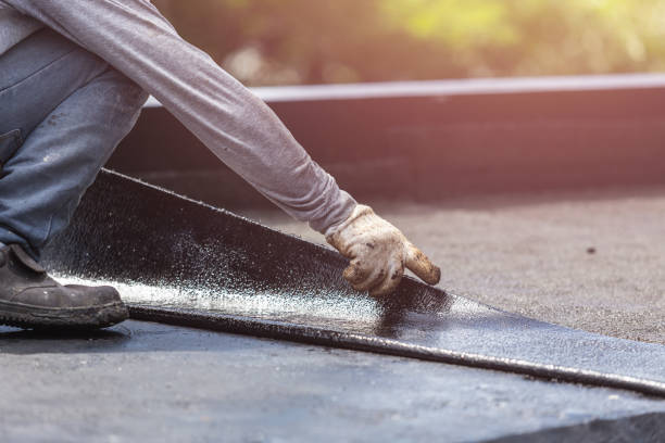 Professional Emergency Waterproofing technician working in Boston, IN